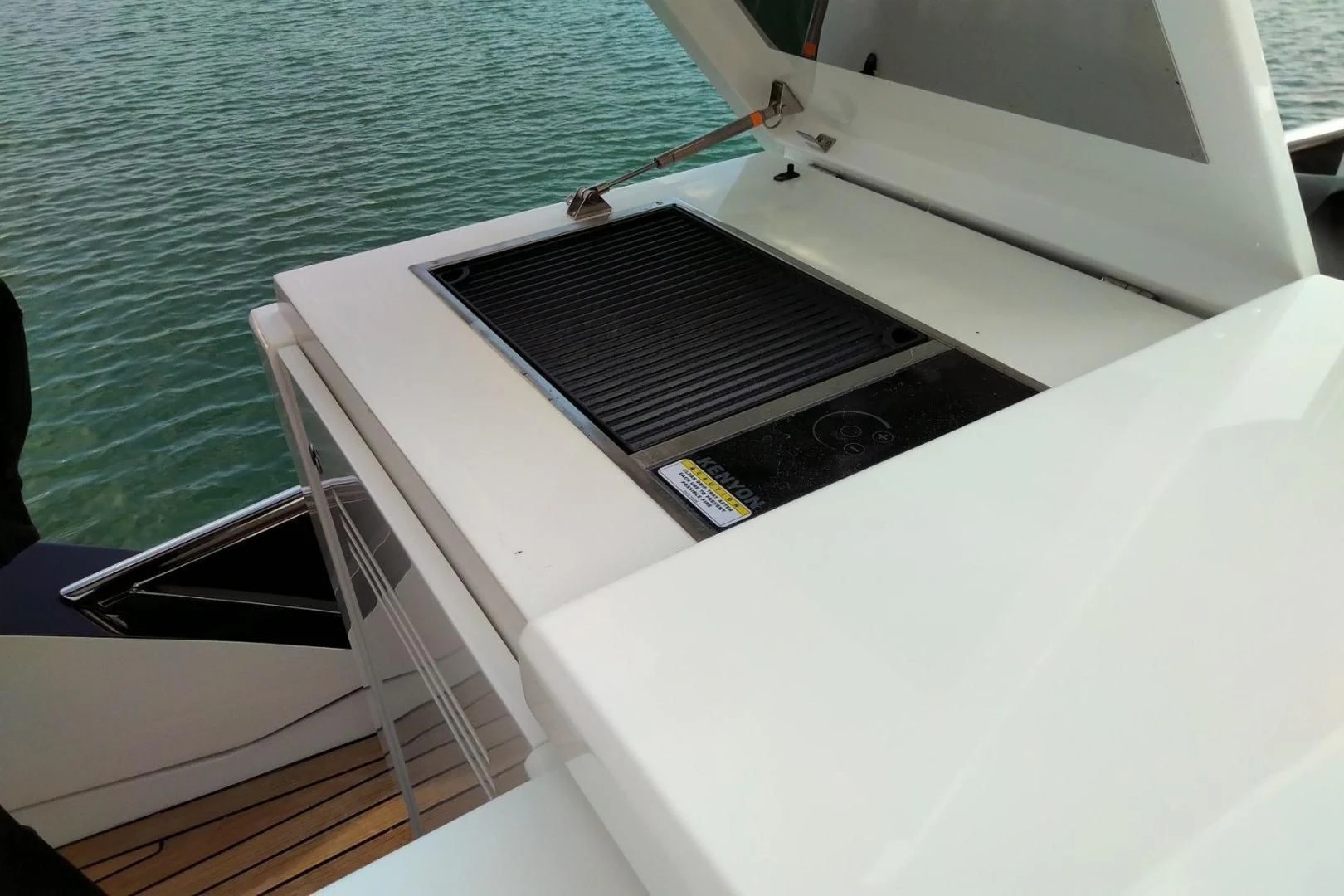a boat with a grill aboard SERENITY Yacht for Sale