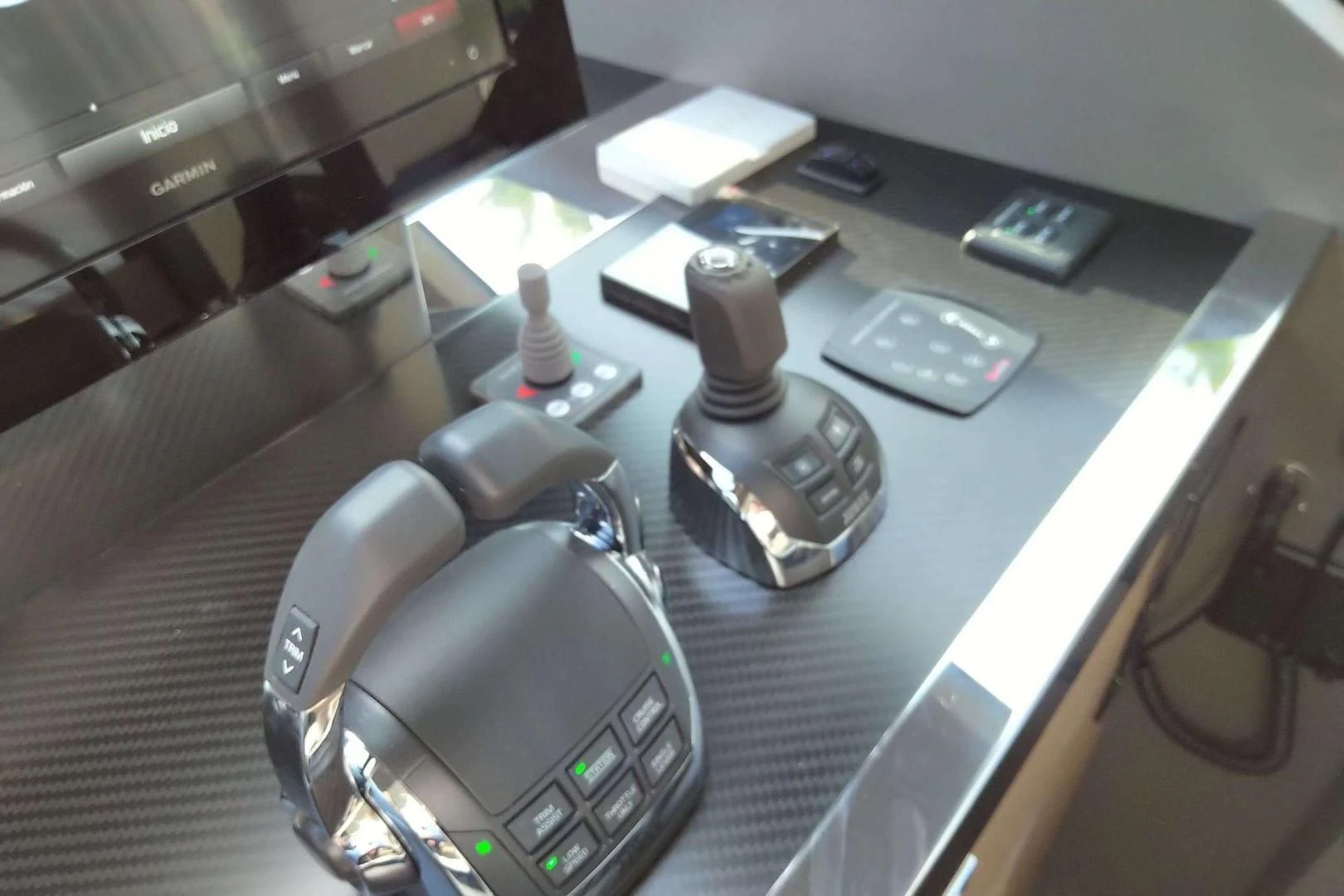 a table with a laptop and other electronics on it aboard SERENITY Yacht for Sale
