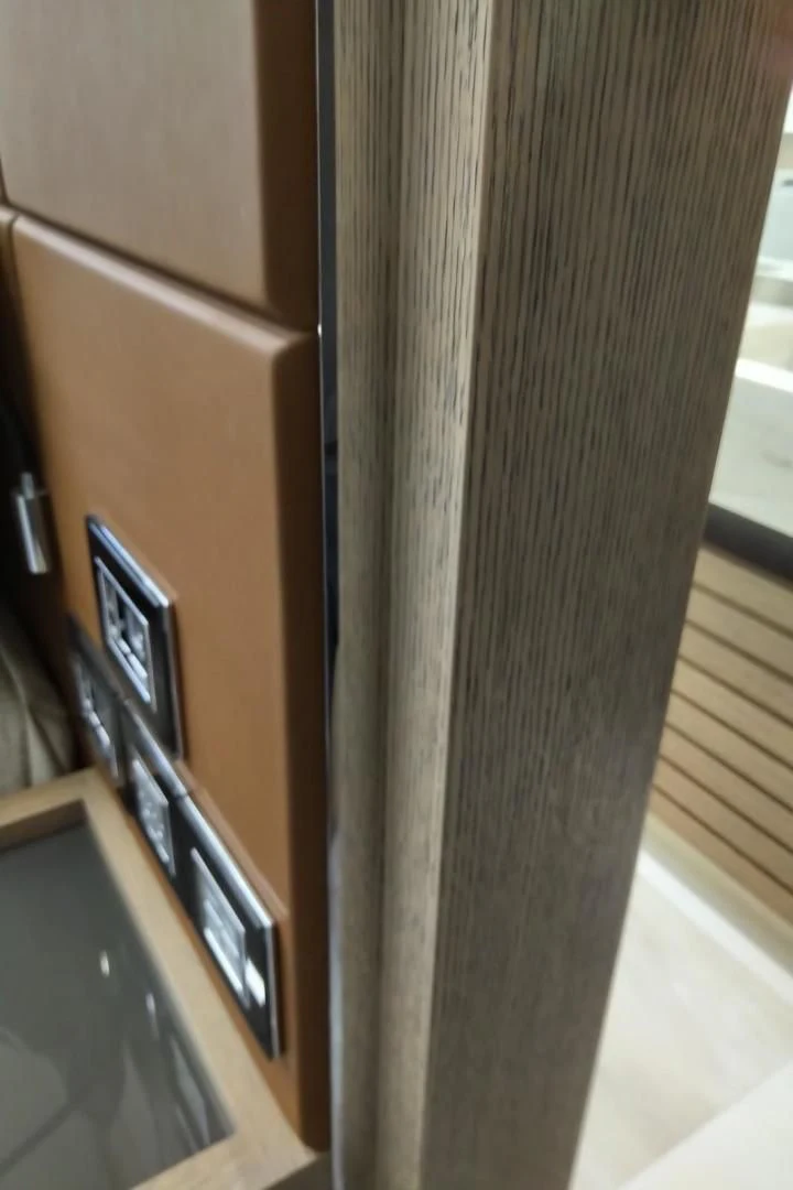 a computer on a cabinet aboard SERENITY Yacht for Sale