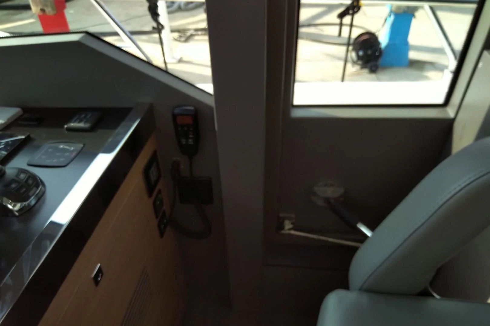 a cat sitting on a desk aboard SERENITY Yacht for Sale