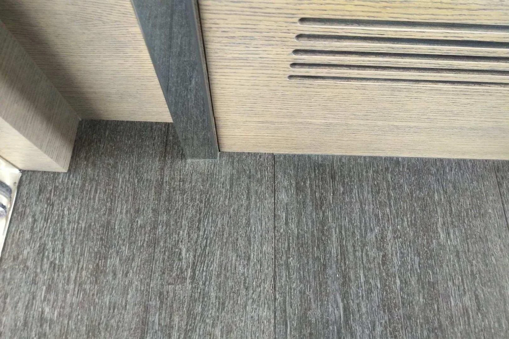 a close up of a wood floor aboard SERENITY Yacht for Sale