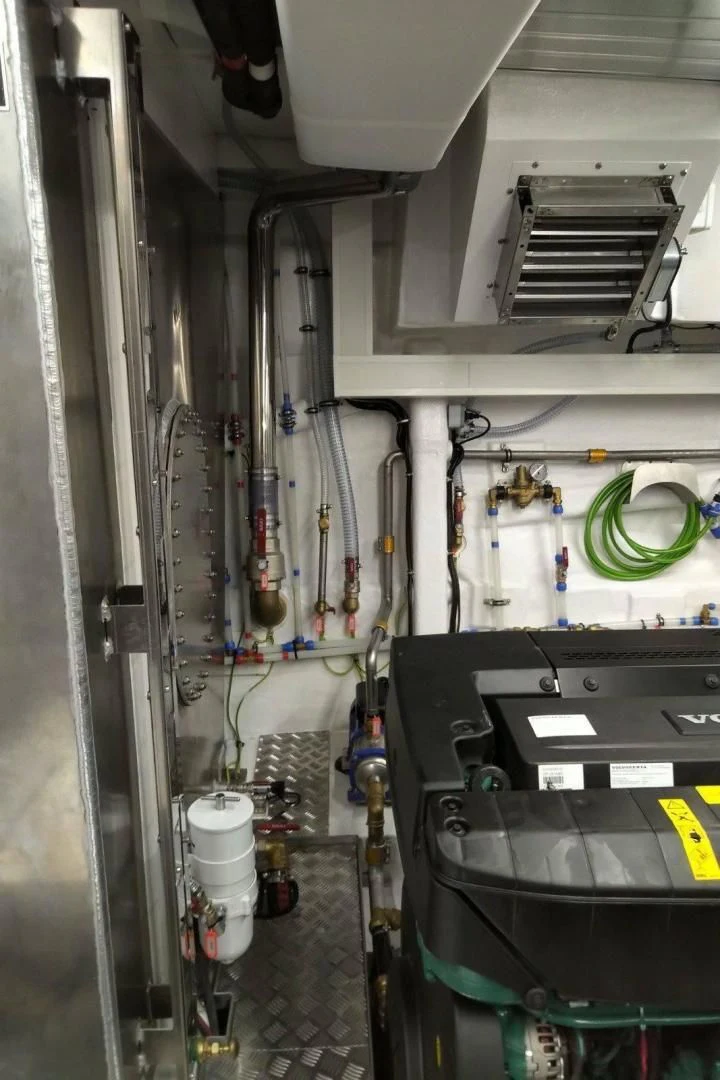 a room with machinery aboard SERENITY Yacht for Sale