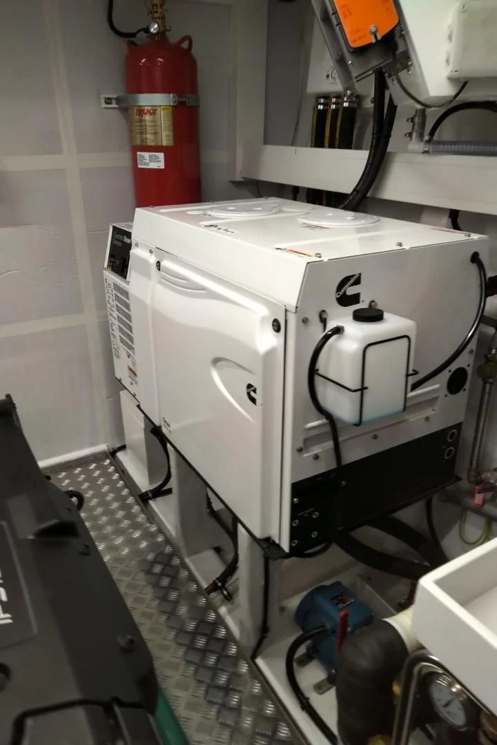 a machine with a red and white cap aboard SERENITY Yacht for Sale