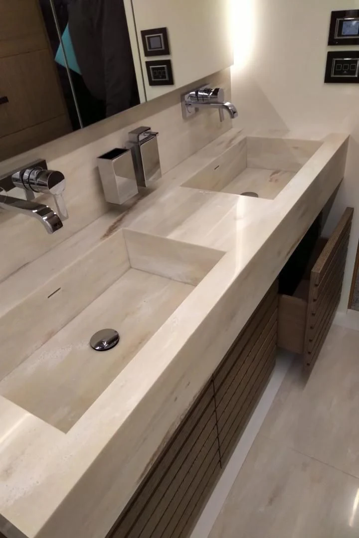 a bathroom with a large countertop aboard SERENITY Yacht for Sale