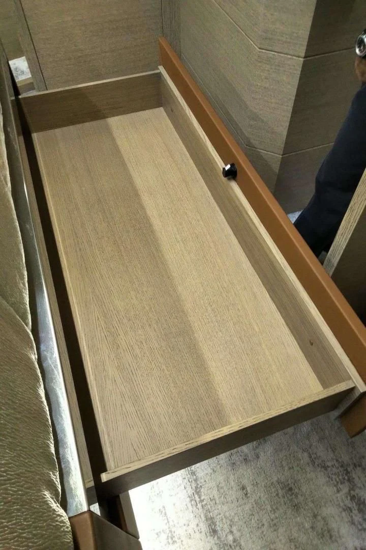 a wooden table with a handle aboard SERENITY Yacht for Sale