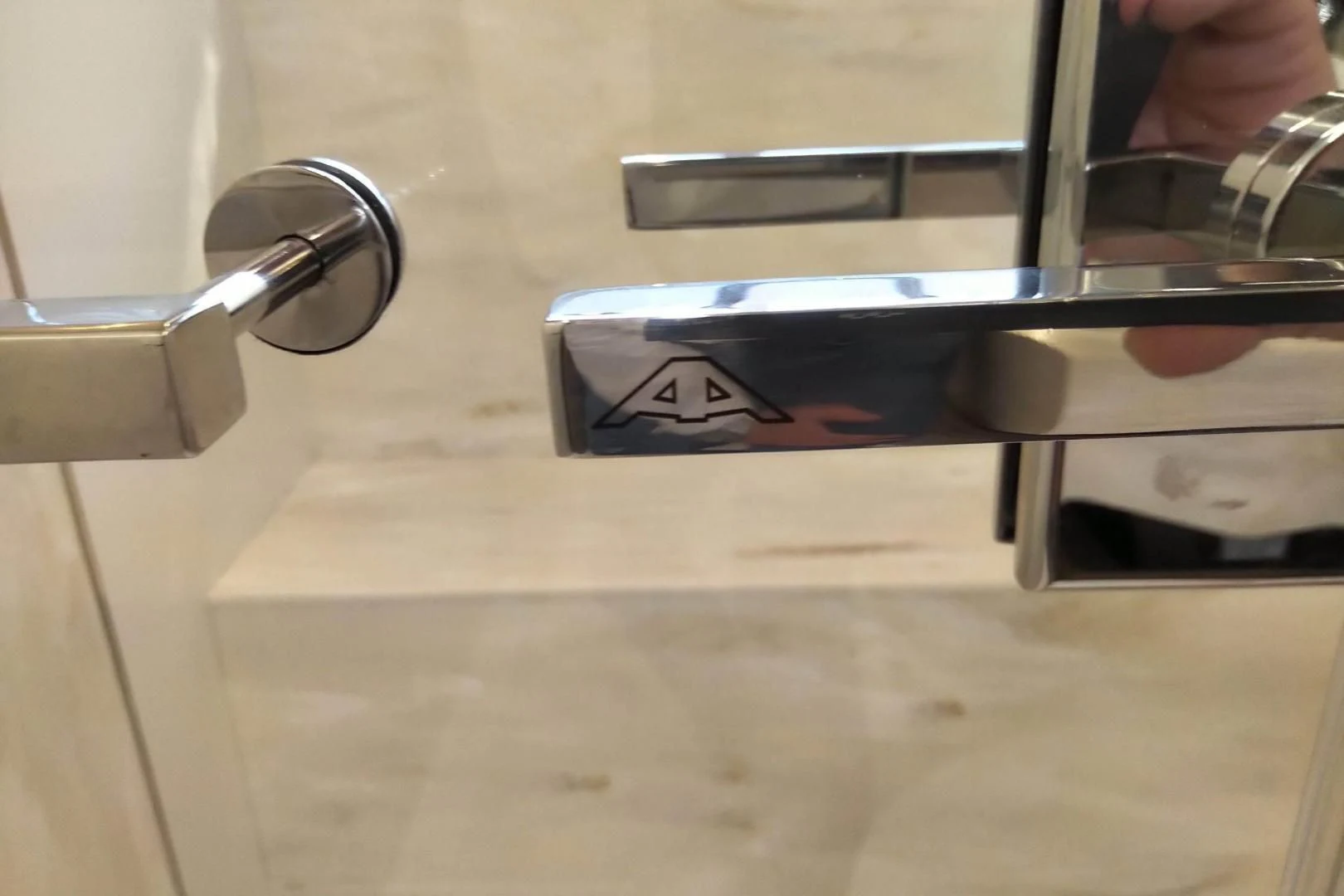 a person holding a metal bar aboard SERENITY Yacht for Sale