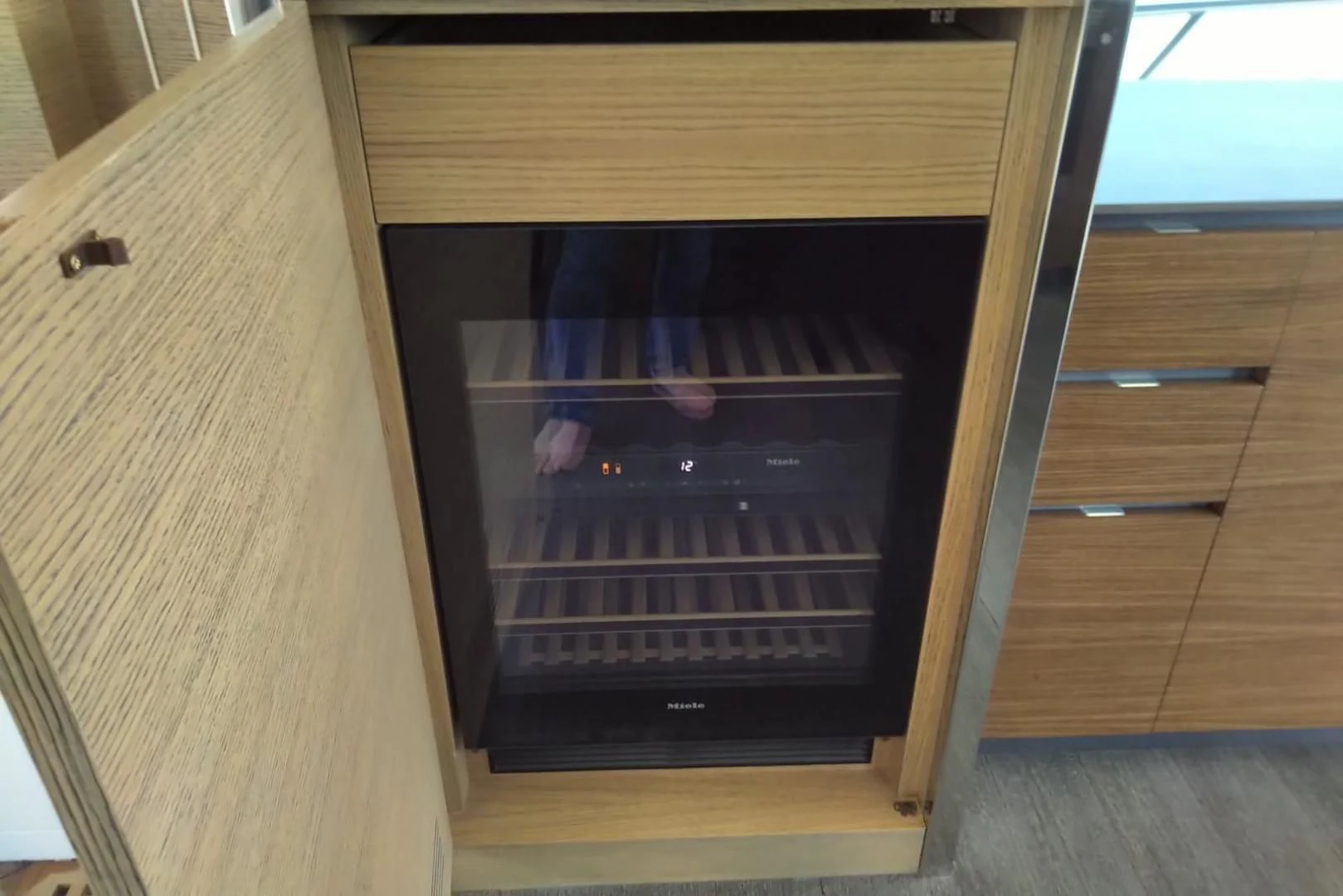 a microwave oven with a person inside aboard SERENITY Yacht for Sale