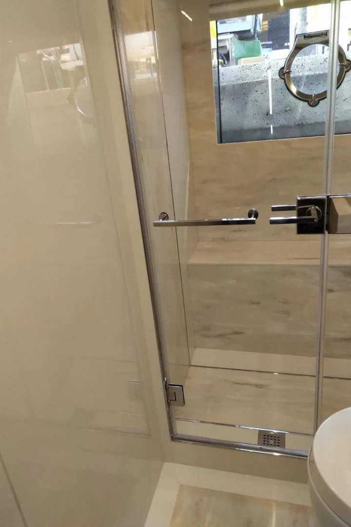 a glass shower door aboard SERENITY Yacht for Sale