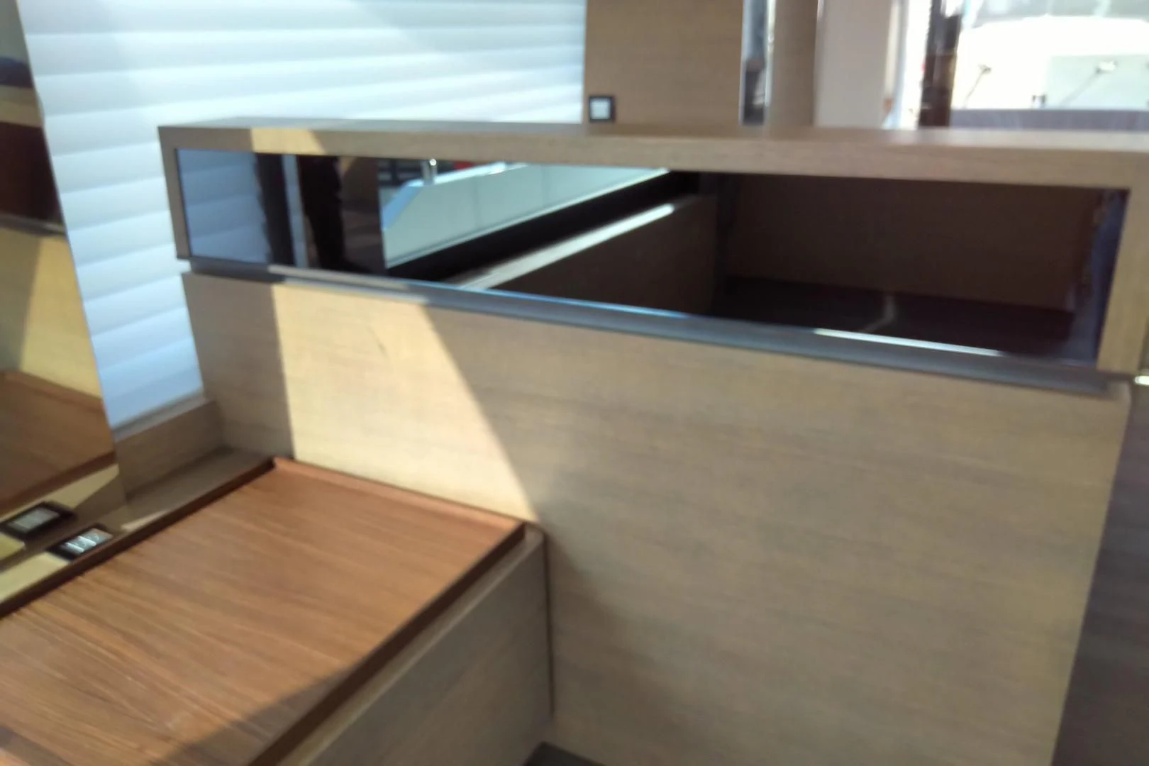 a table with a laptop on it aboard SERENITY Yacht for Sale