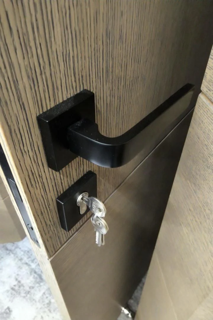 a black object on a wooden surface aboard SERENITY Yacht for Sale