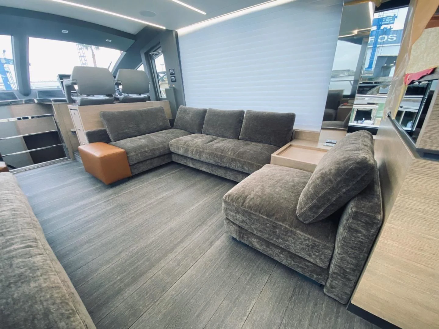 a couch and a chair in a room aboard SERENITY Yacht for Sale