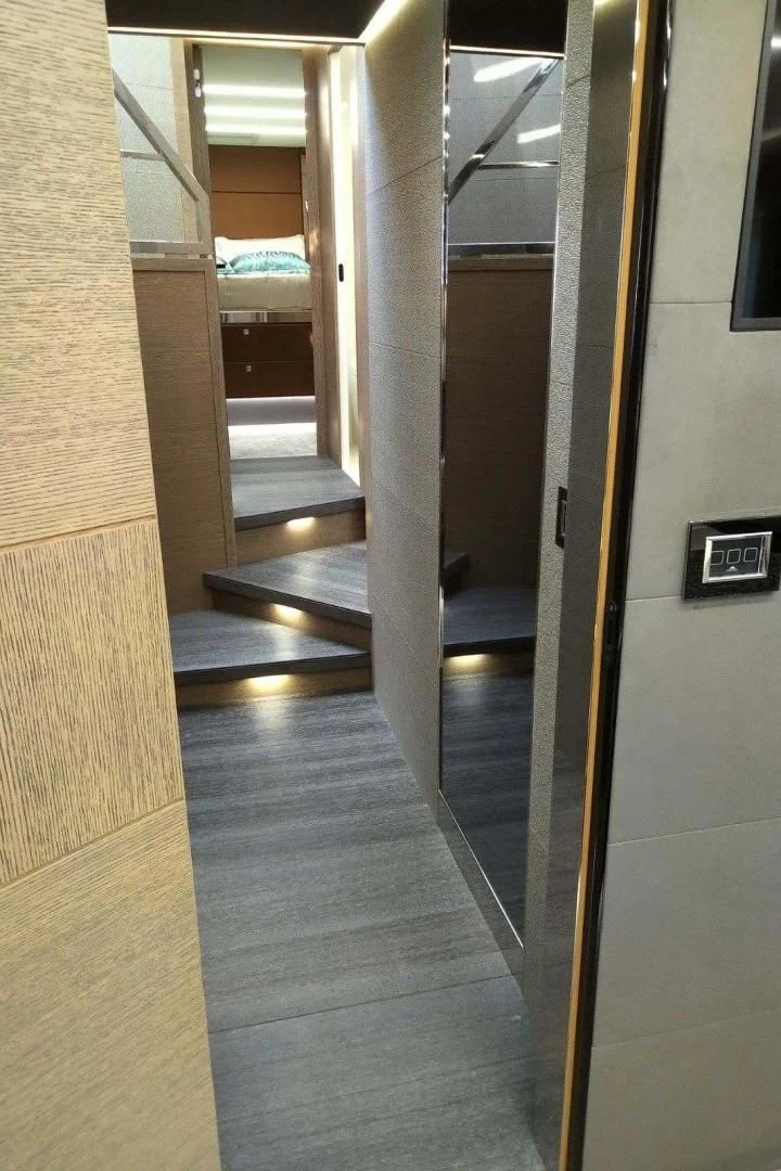 a hallway with a door aboard SERENITY Yacht for Sale
