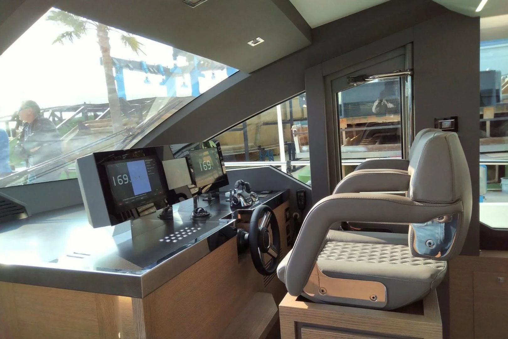 a room with computers and monitors aboard SERENITY Yacht for Sale