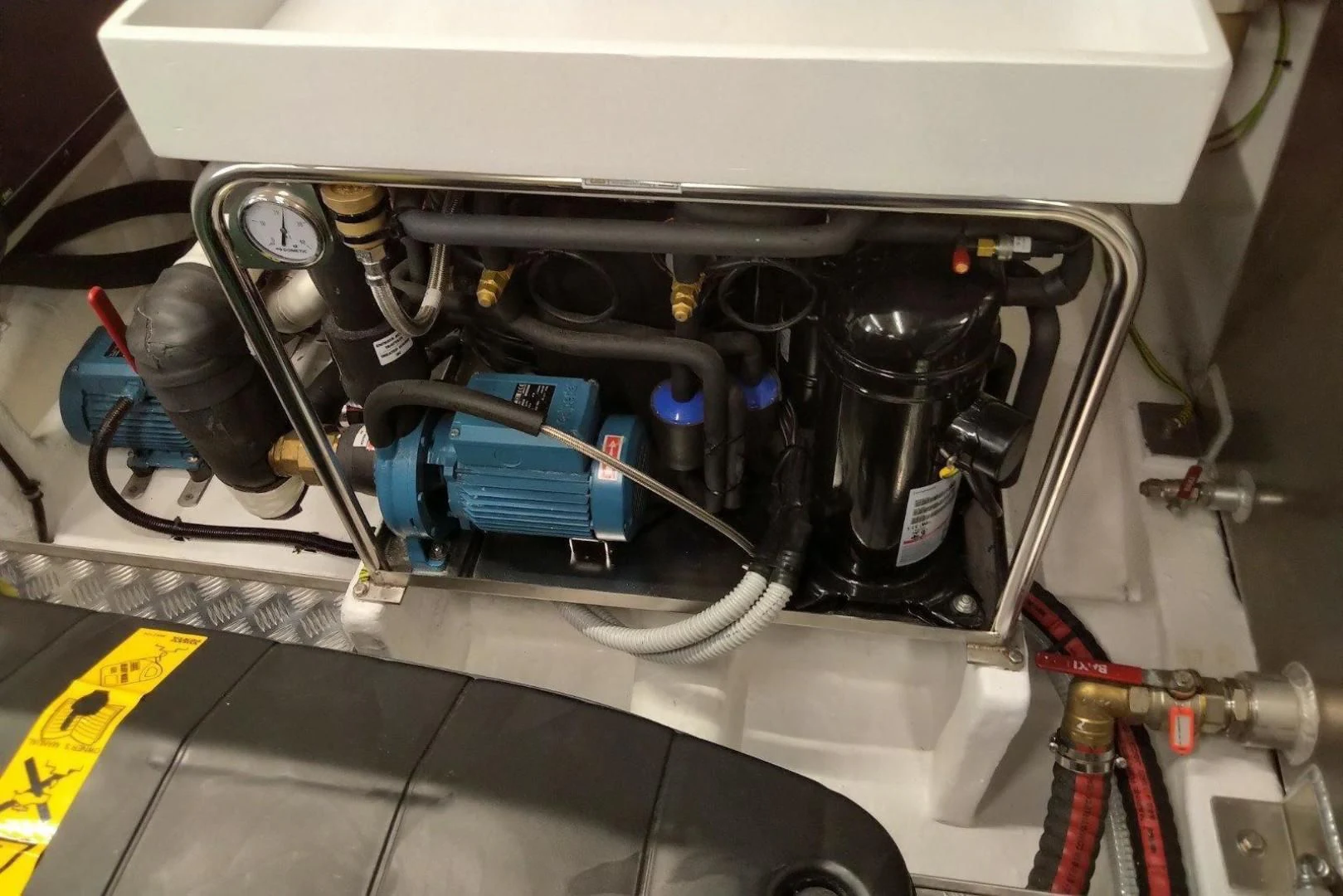 a car engine with a blue cable aboard SERENITY Yacht for Sale