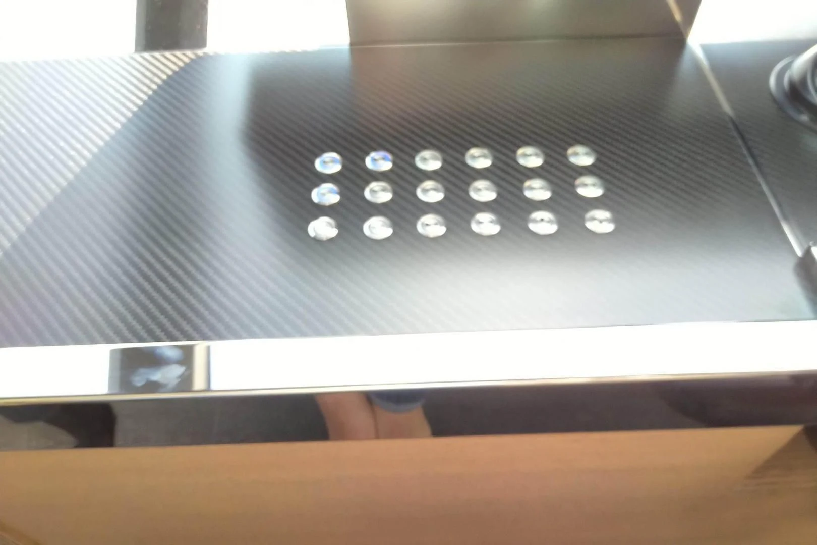 a close-up of a black device aboard SERENITY Yacht for Sale