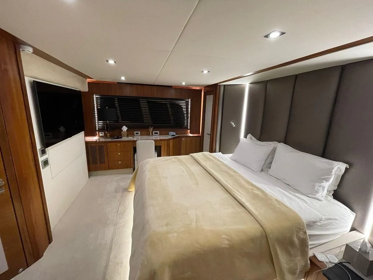 a bed in a room aboard BLADE 6 Yacht for Charter