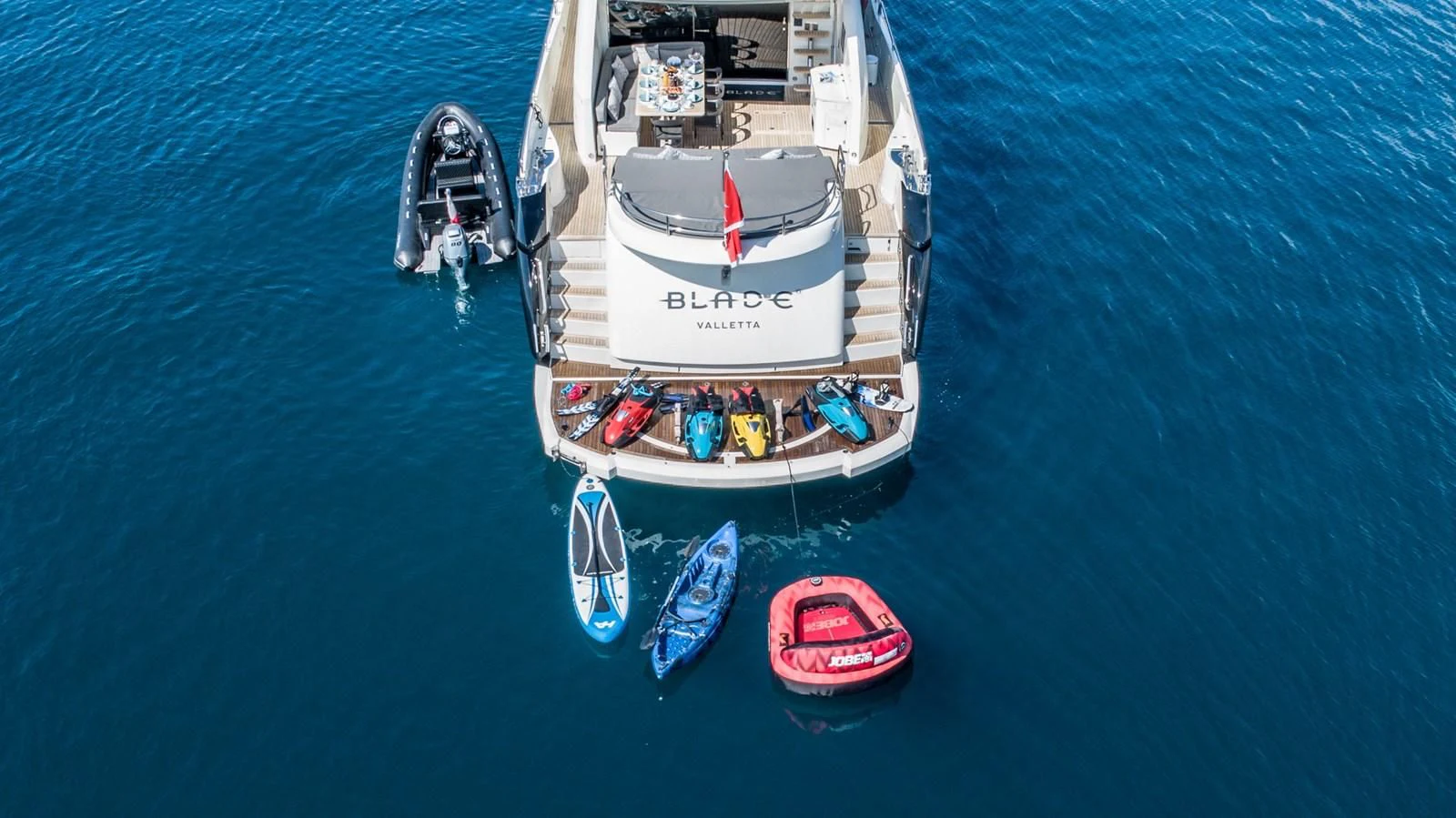 a boat on the water aboard BLADE 6 Yacht for Charter