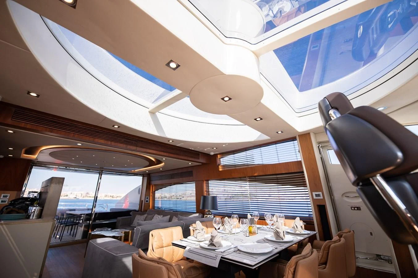 a room with a table and chairs aboard BLADE 6 Yacht for Charter