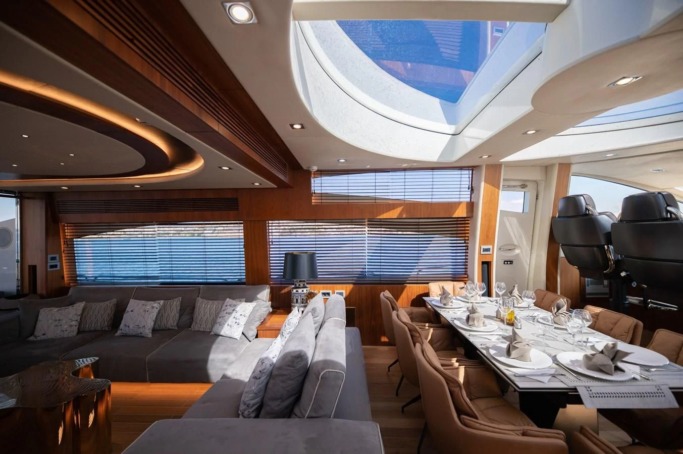 a room with a table and chairs aboard BLADE 6 Yacht for Charter