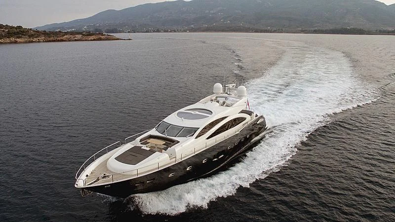 a white yacht in the water aboard BLADE 6 Yacht for Charter