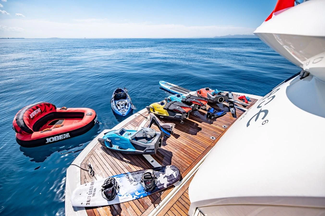 a group of boats on the water aboard BLADE 6 Yacht for Charter