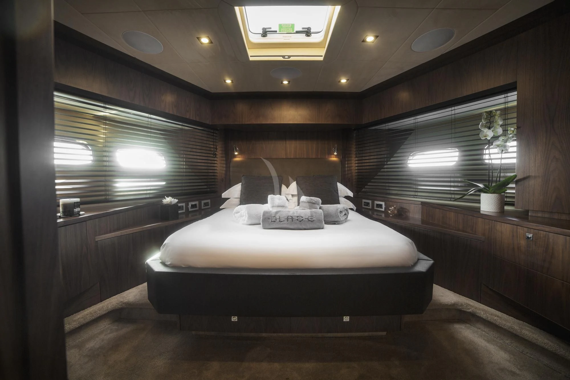 a bed in a room aboard BLADE 6 Yacht for Charter
