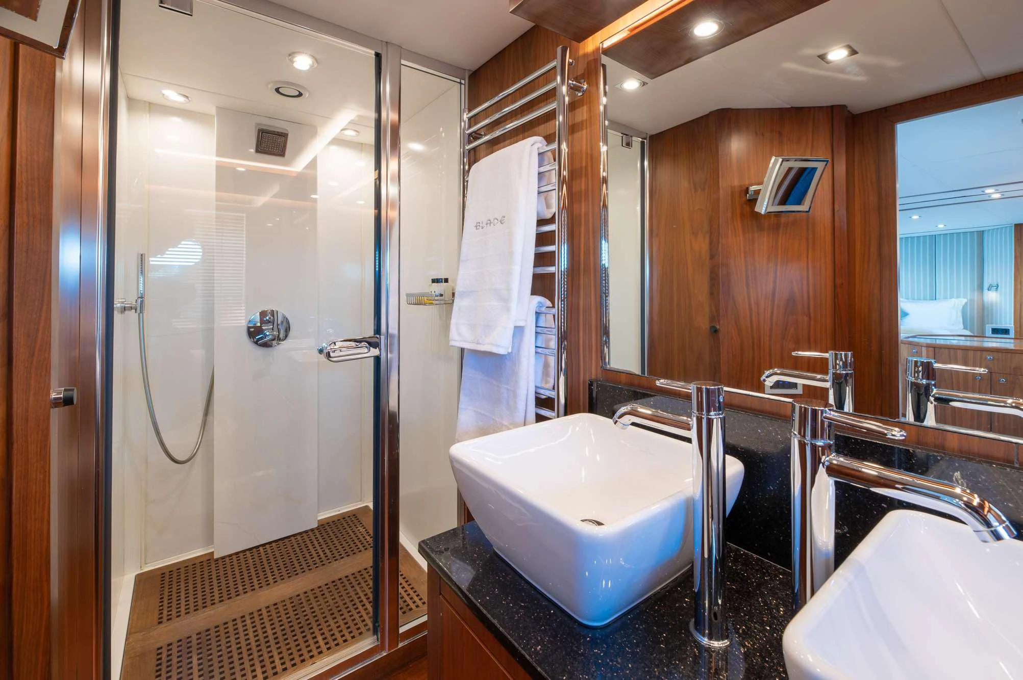 a bathroom with a large tub aboard BLADE 6 Yacht for Charter