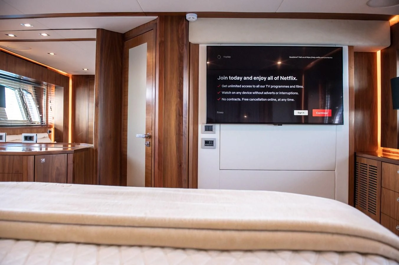 a bed in a room aboard BLADE 6 Yacht for Charter