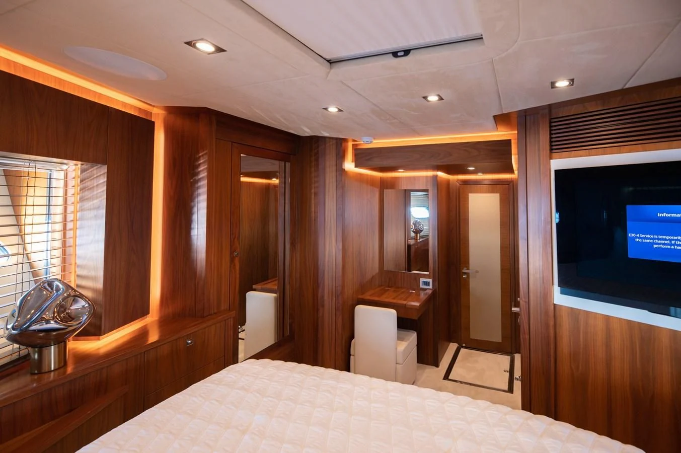 a hotel room with a bed aboard BLADE 6 Yacht for Charter