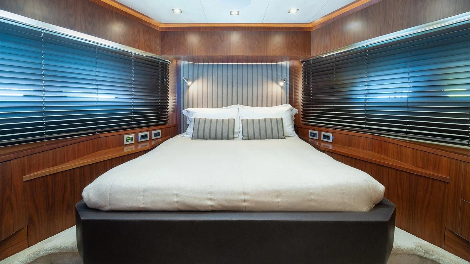 a bed in a room aboard BLADE 6 Yacht for Charter