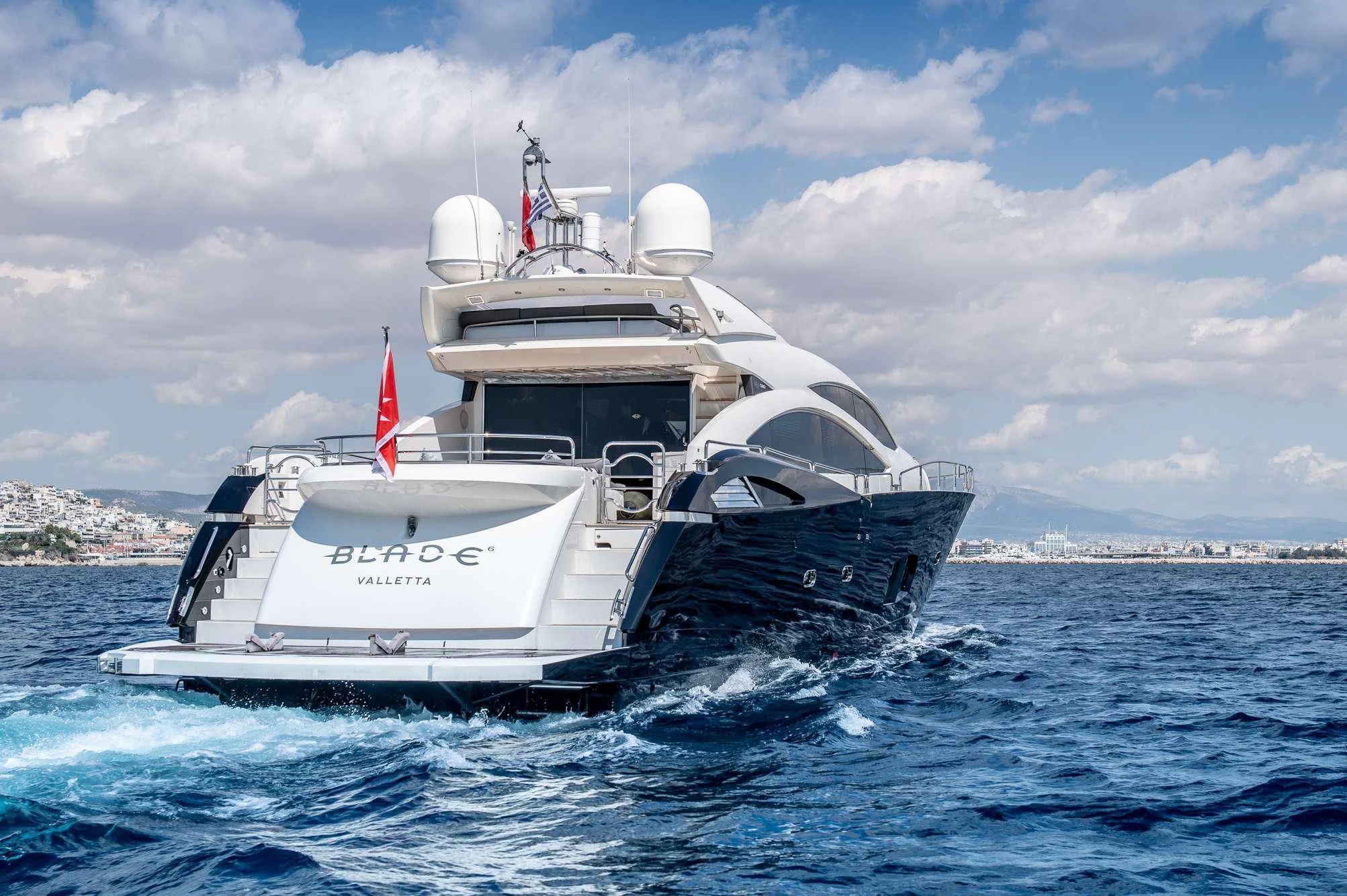 a boat in the water aboard BLADE 6 Yacht for Charter