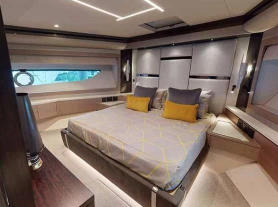 a large bed in a room aboard SUNSEEKER 88/508 Yacht for Sale