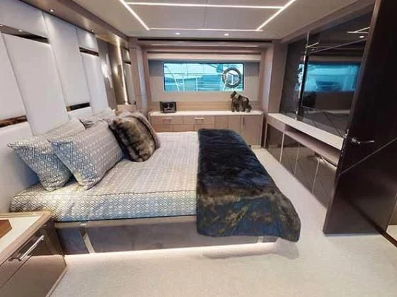 a living room with a couch and a tv aboard SUNSEEKER 88/508 Yacht for Sale