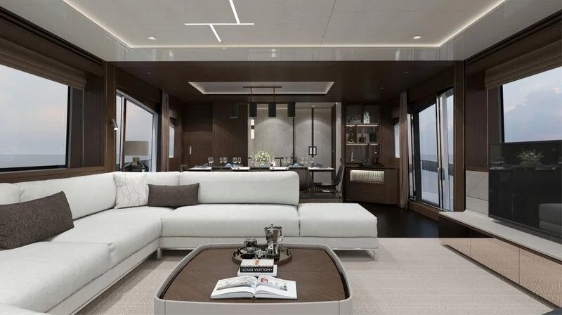 a living room with a white couch aboard SUNSEEKER 88/508 Yacht for Sale