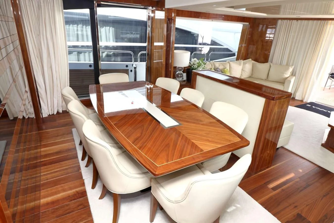 a room with a table and chairs aboard SUNSEEKER 86 Yacht for Sale