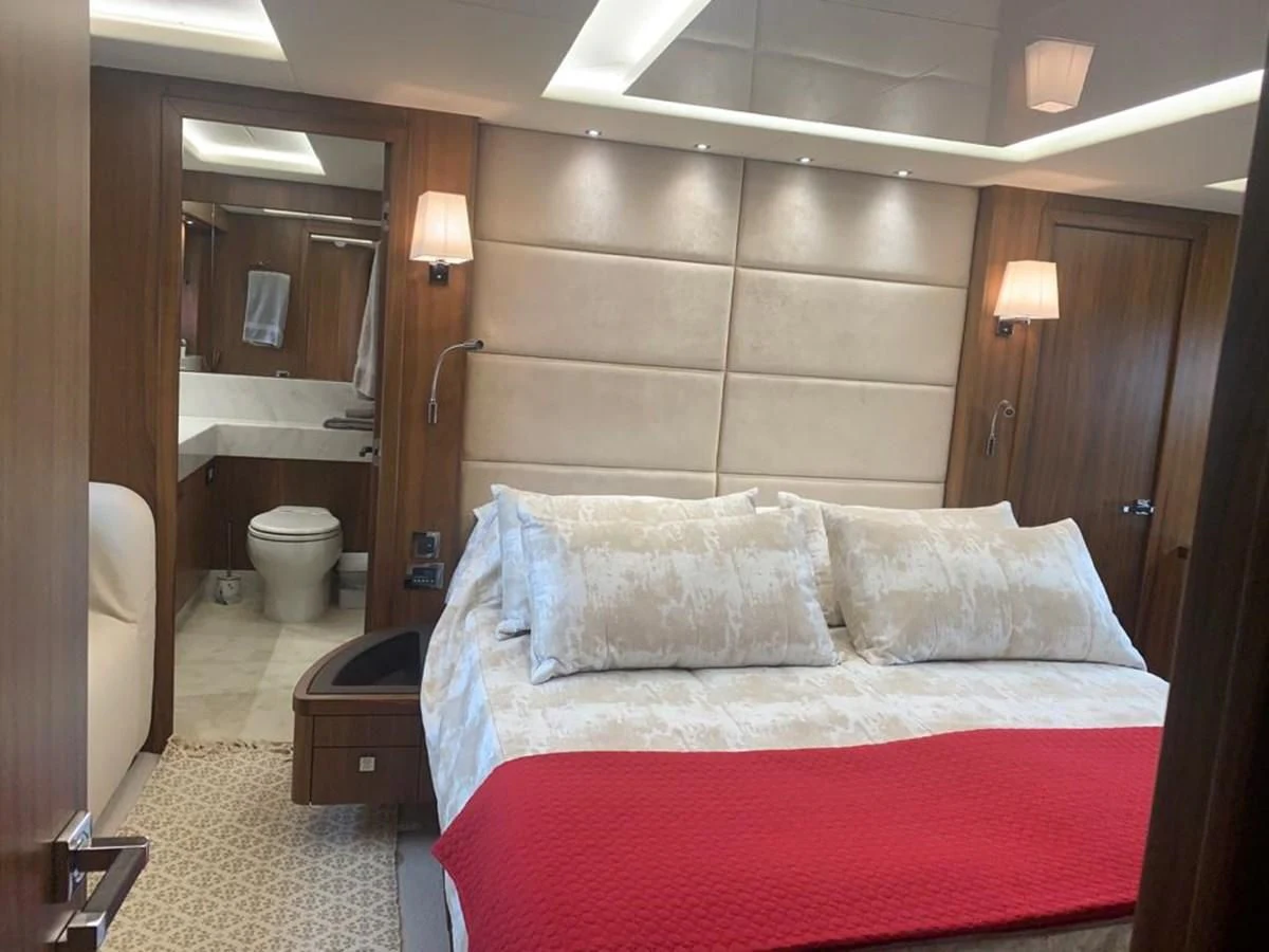 a bed in a room aboard SUNSEEKER 86 Yacht for Sale