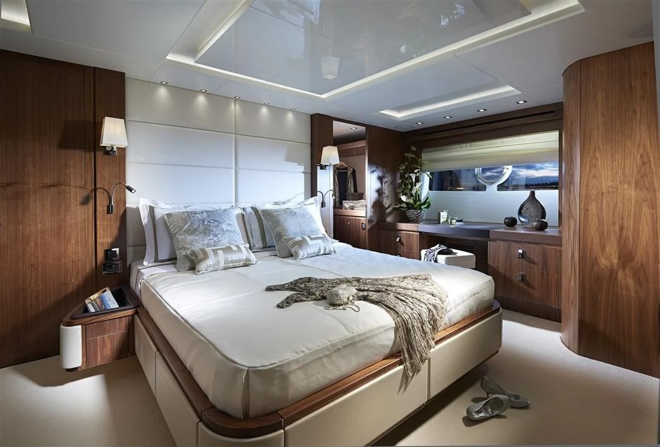 a bed in a room aboard SUNSEEKER 86 Yacht for Sale