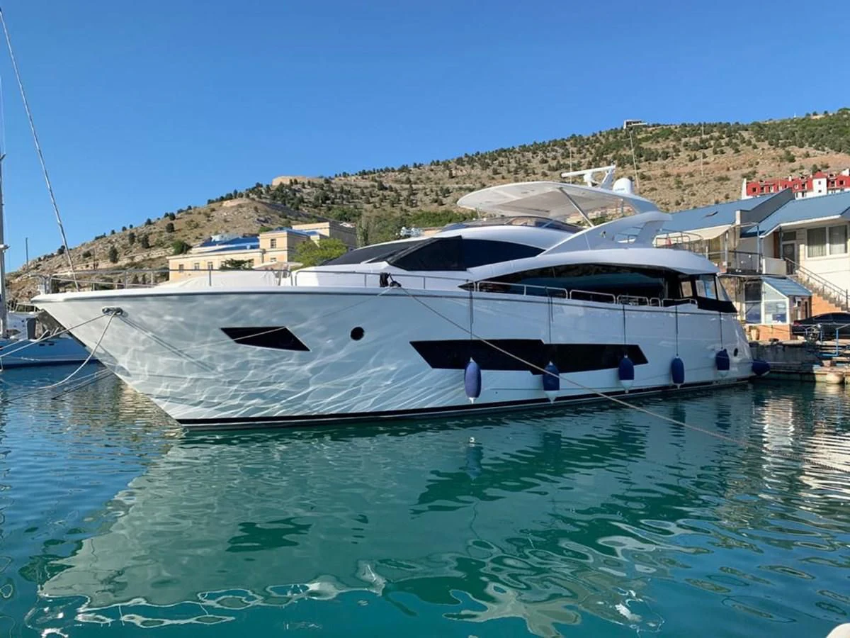 a boat in the water aboard SUNSEEKER 86 Yacht for Sale
