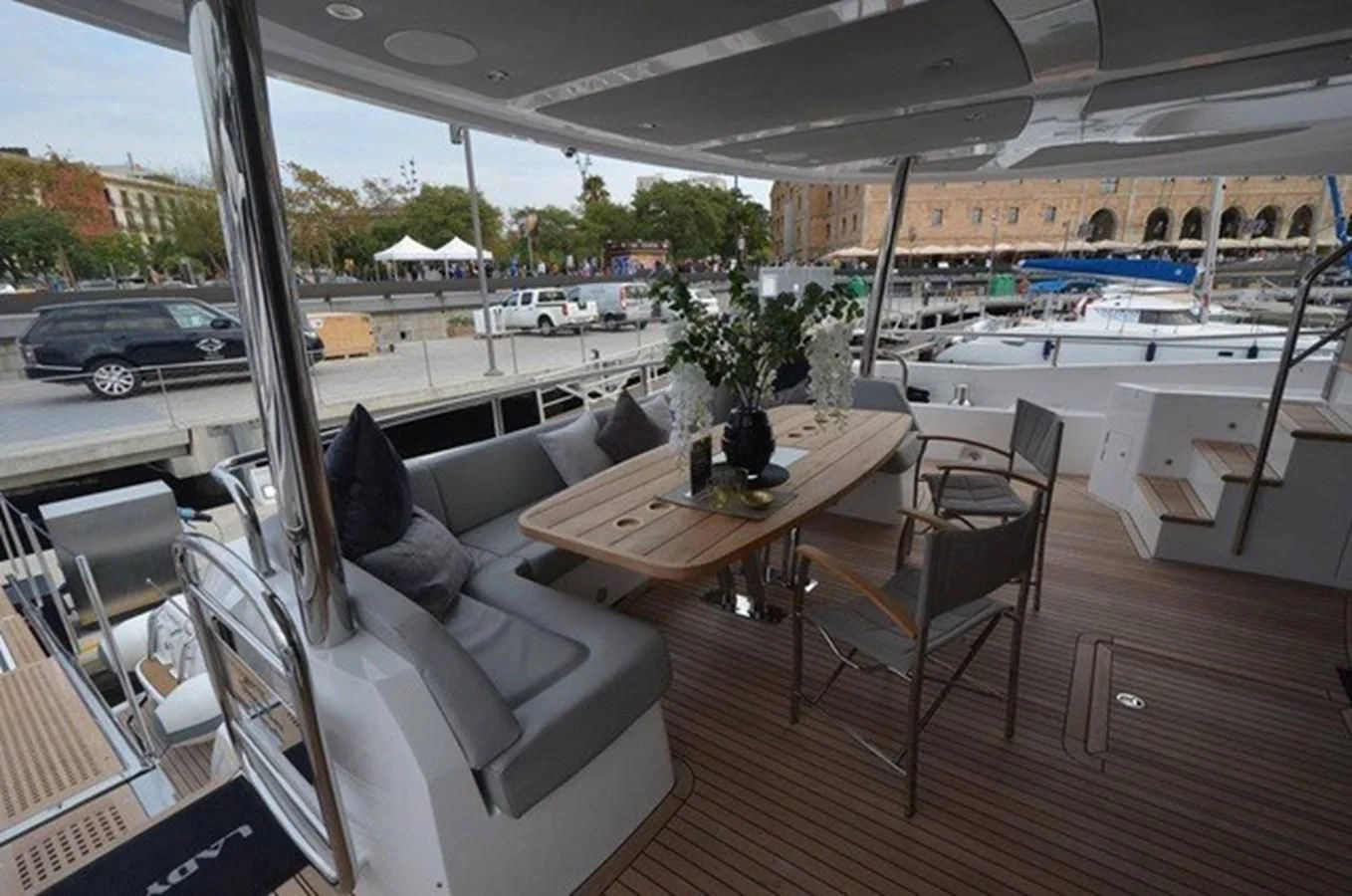 a table and chairs on a deck aboard SUNSEEKER 86 Yacht for Sale