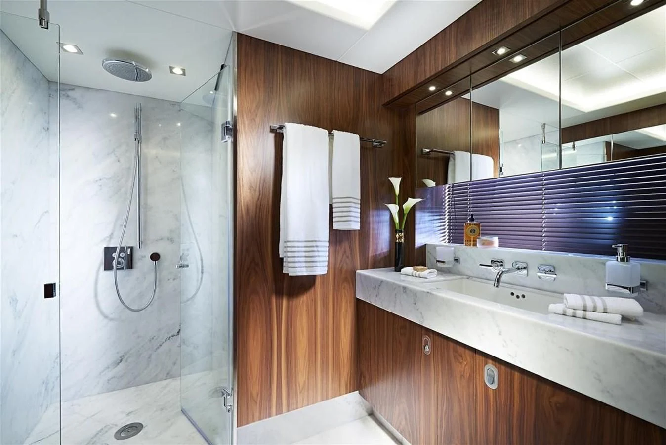a bathroom with a sink and a shower aboard SUNSEEKER 86 Yacht for Sale