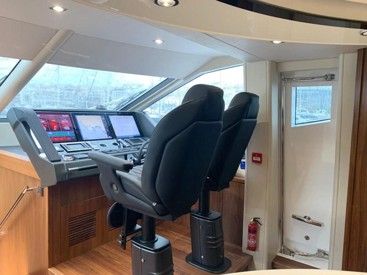 a room with a desk and computer aboard SUNSEEKER 86 Yacht for Sale