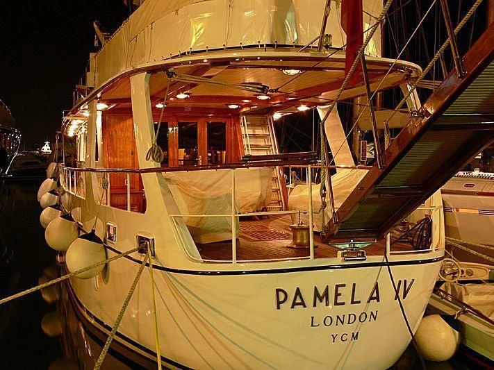 a boat with lights on the front aboard PAMELA IV Yacht for Sale