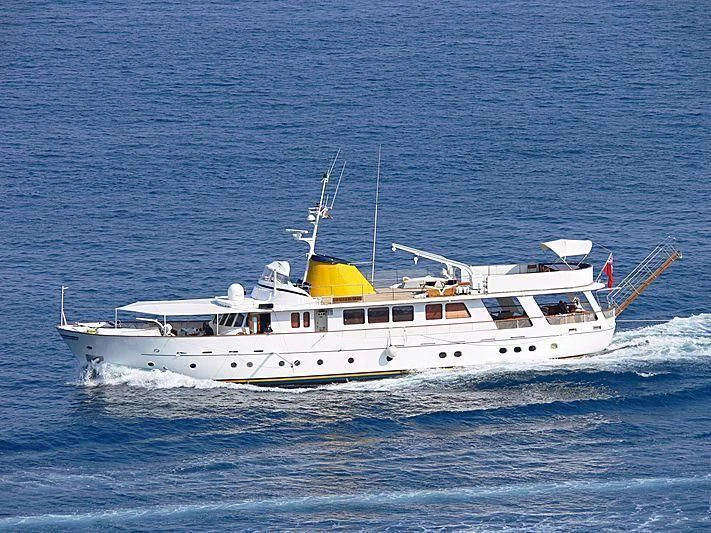a white boat in the water aboard PAMELA IV Yacht for Sale