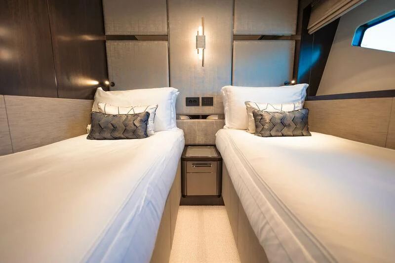a room with two beds aboard MOONLIGHT Yacht for Sale