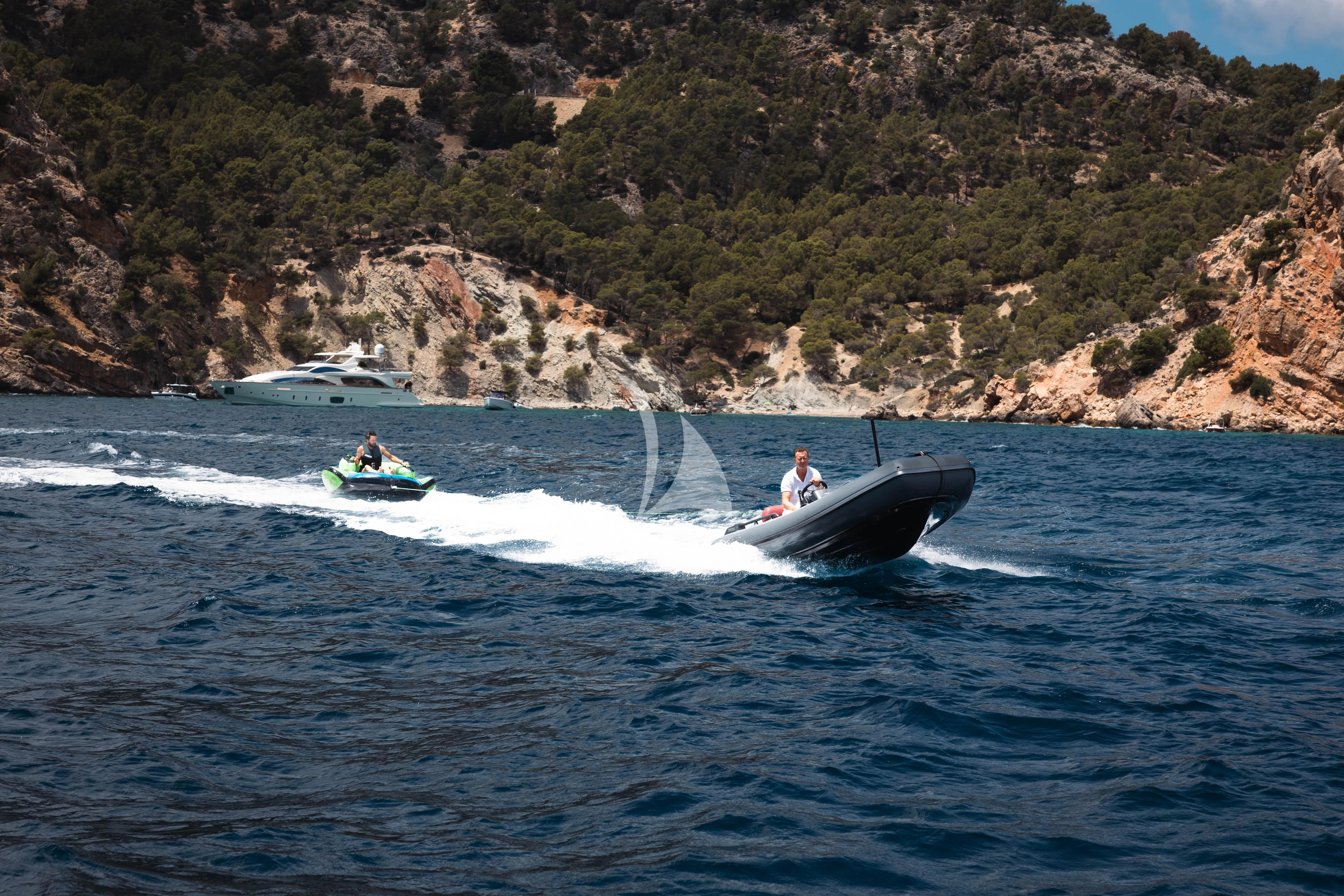a couple of people on a boat in the water aboard MOONLIGHT Yacht for Sale