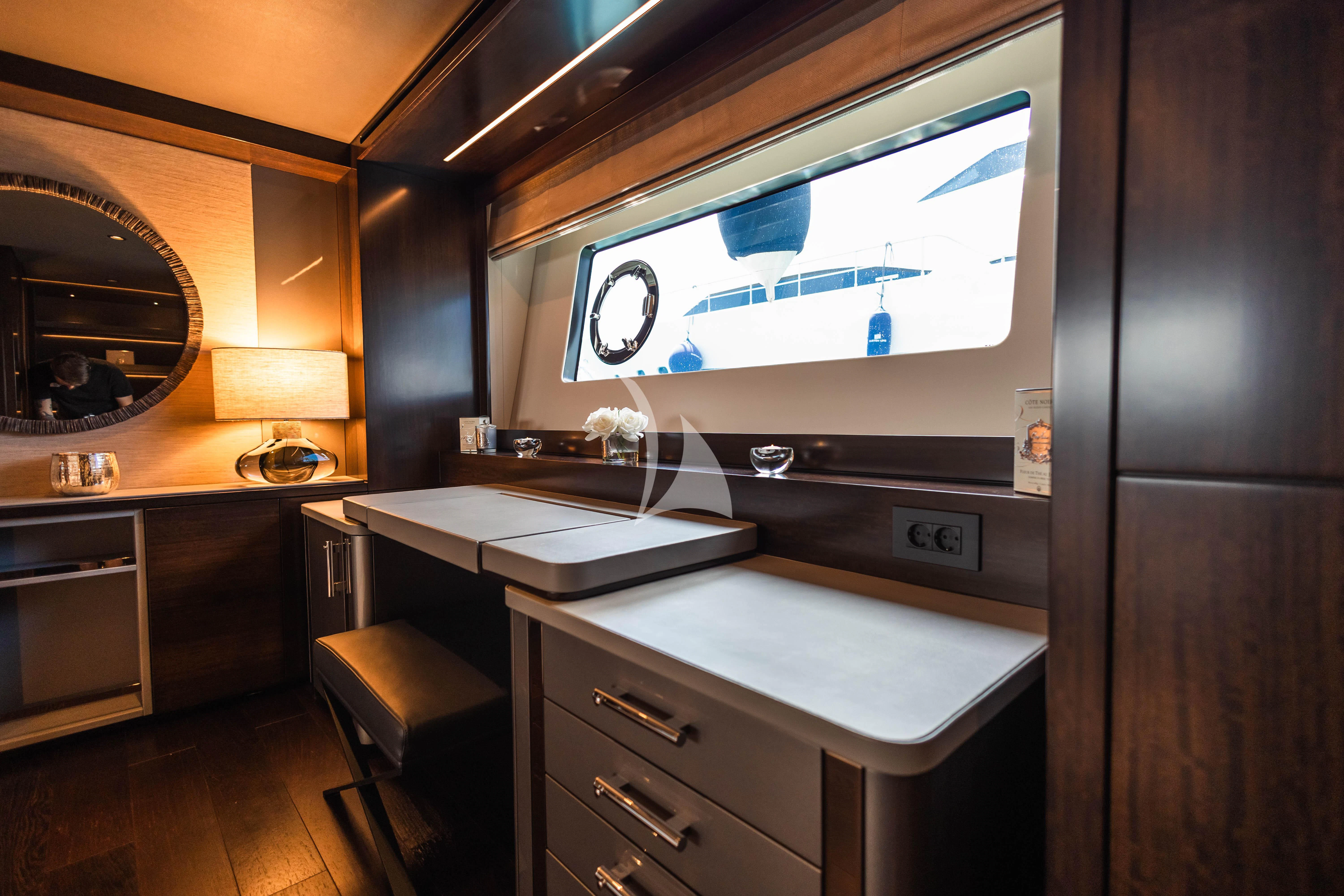 a tv on a wall aboard MOONLIGHT Yacht for Sale