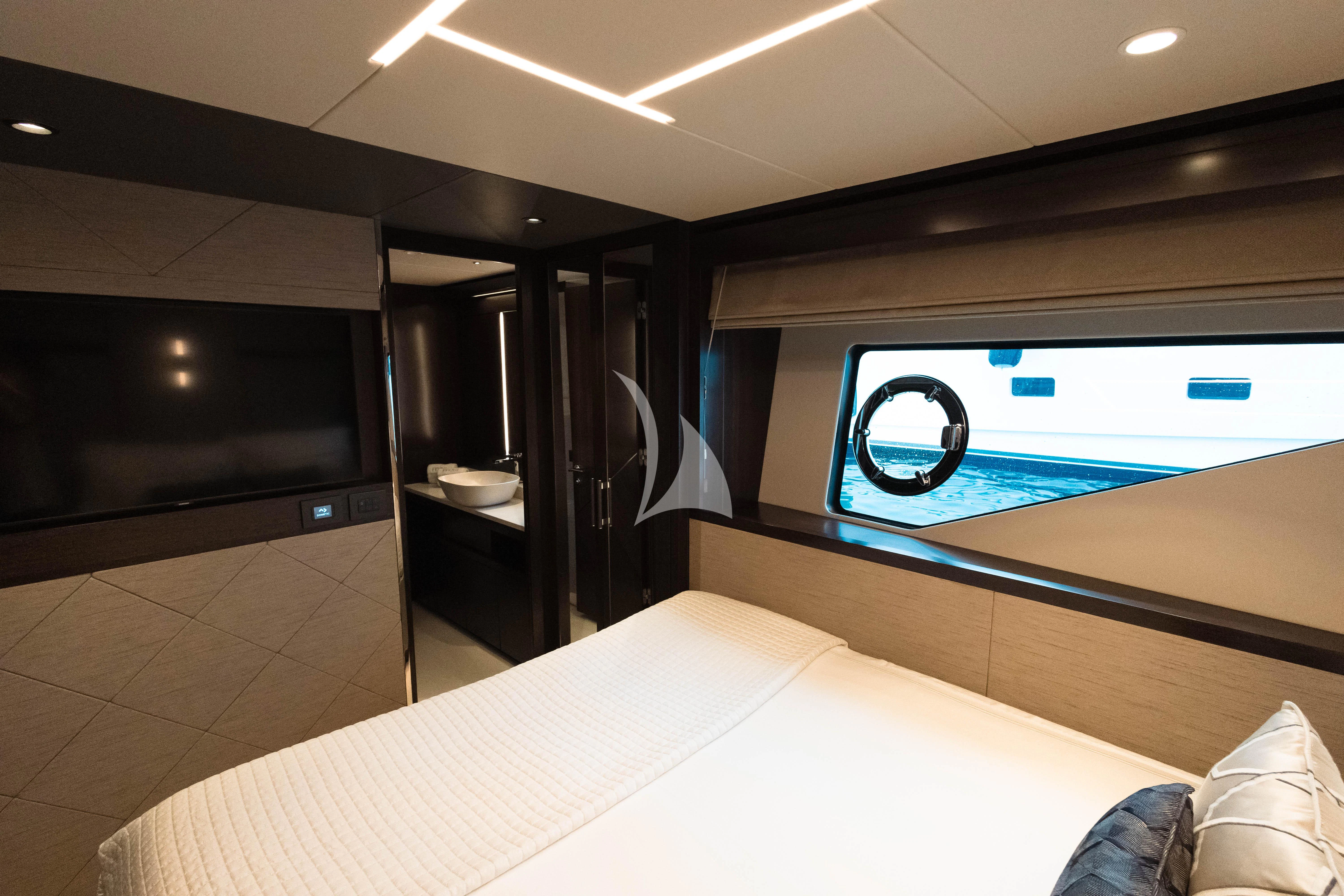 a room with a large mirror and a bed aboard MOONLIGHT Yacht for Sale