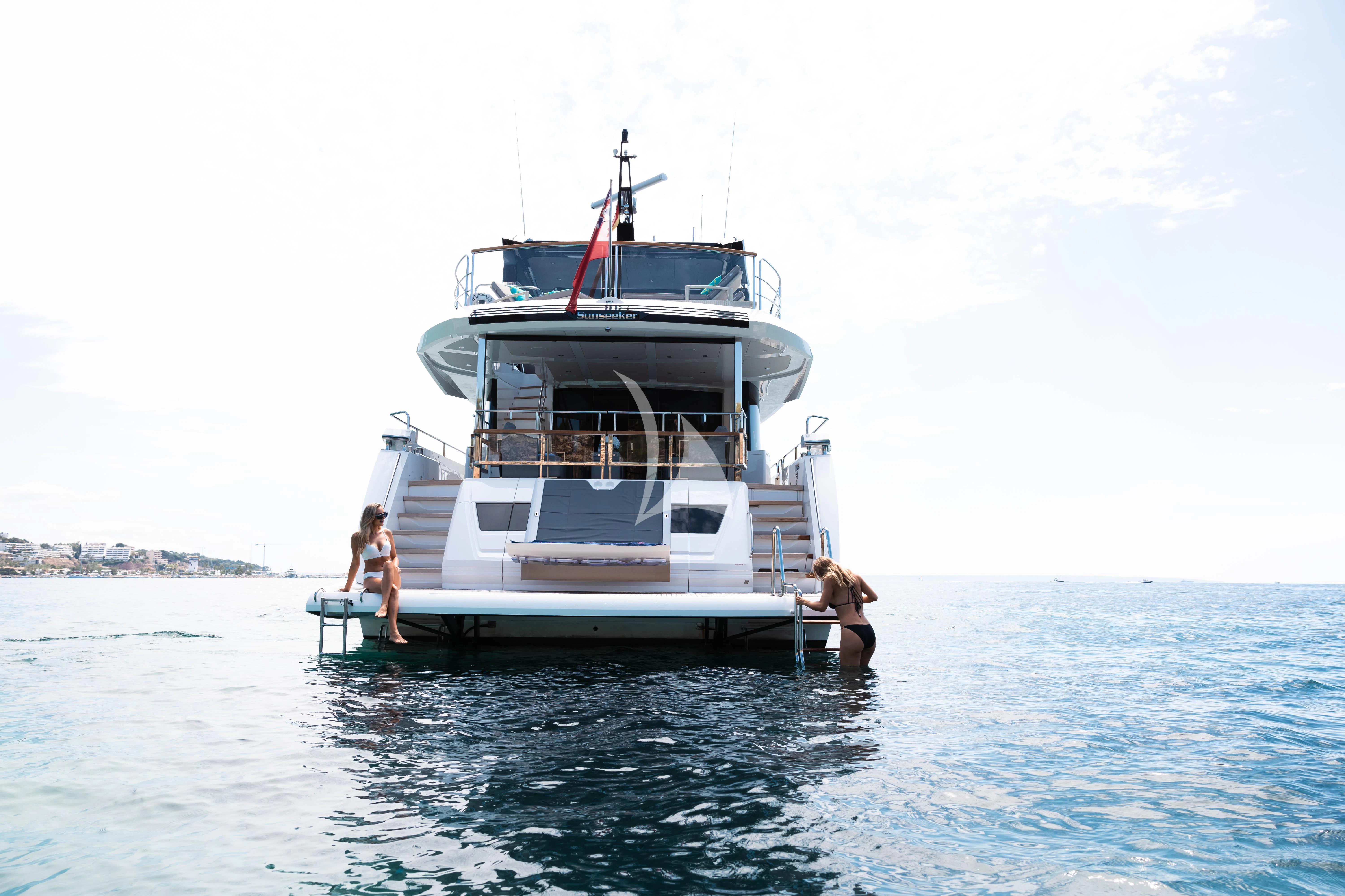 a couple of people on a boat aboard MOONLIGHT Yacht for Sale