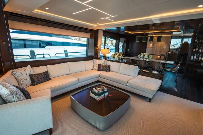 a living room with a large window aboard MOONLIGHT Yacht for Sale