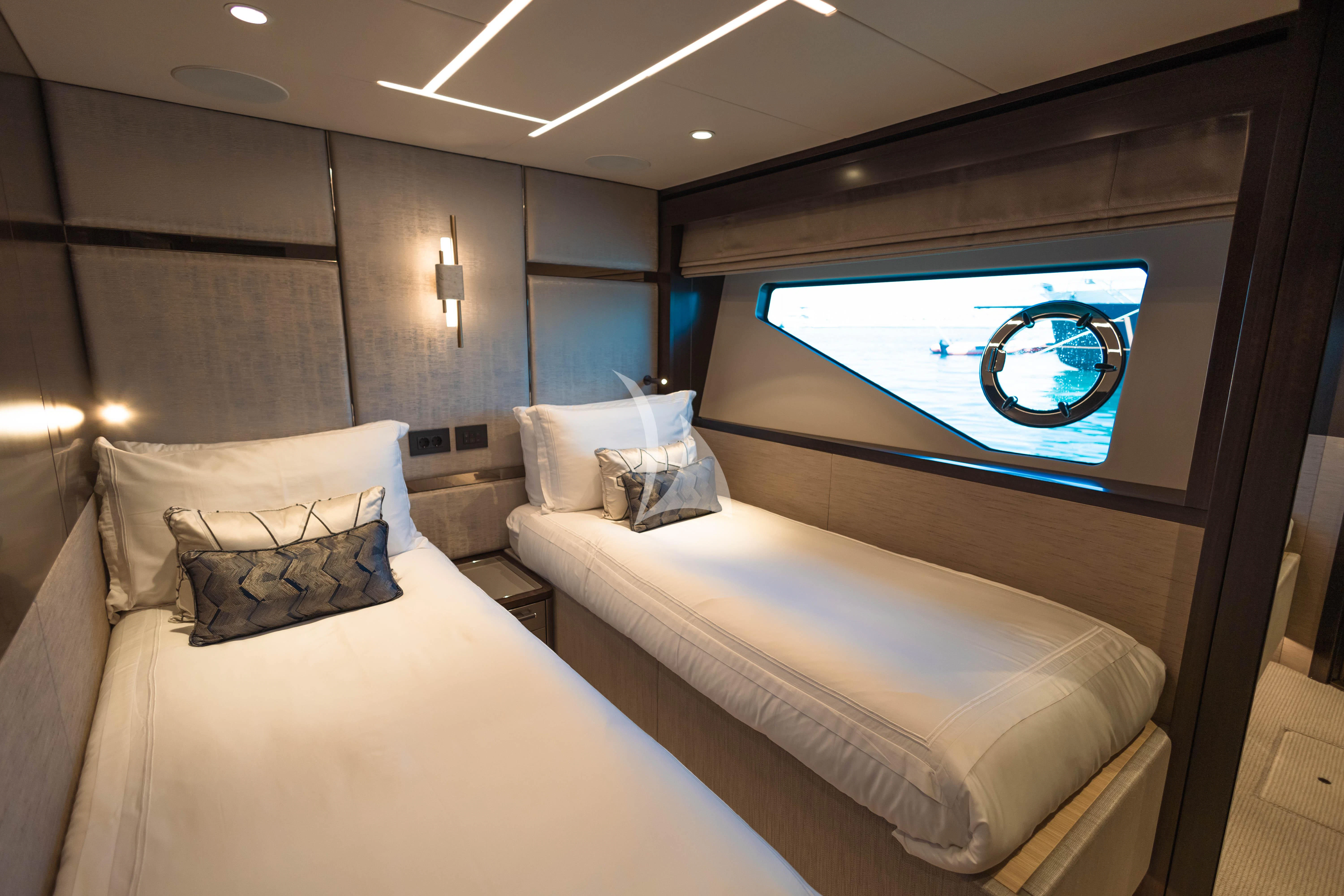 a room with two beds aboard MOONLIGHT Yacht for Sale